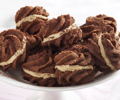 Rich, crumbly, chocolatey biscuits are sandwiched with a rich coffee cream filling to create these divine bite sized treats. Enjoy with a mug of coffee or tea for a lovely sweet treat. Coffee Biscuits, Chocolate Melting, Mug Of Coffee, Melting Moments, Cream Filling, Coffee Cream, Biscuit Cookies, Tea Cakes, Food Cakes