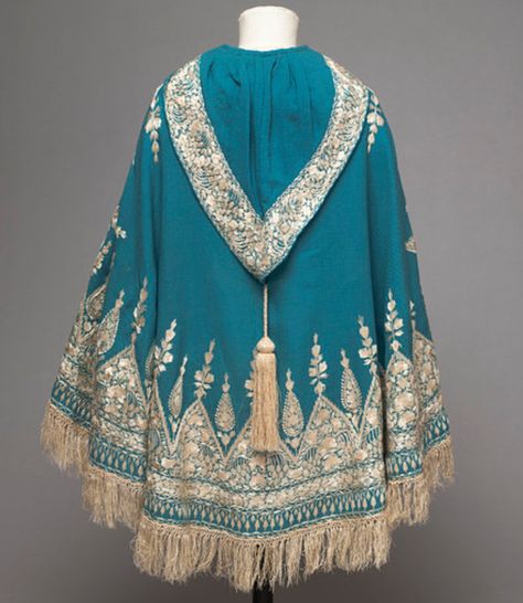 Child’s cape. Twilled peacock blue woollen cloth, embroidered in cream silk thread, with a cream tassel on the hood; Anglo-Indian, 1860-70, V&A Anting Manik, Capes For Kids, Cream Silk, Historical Costume, Moda Vintage, Peacock Blue, Fantasy Clothing, Fantasy Fashion, Jewelry Shopping