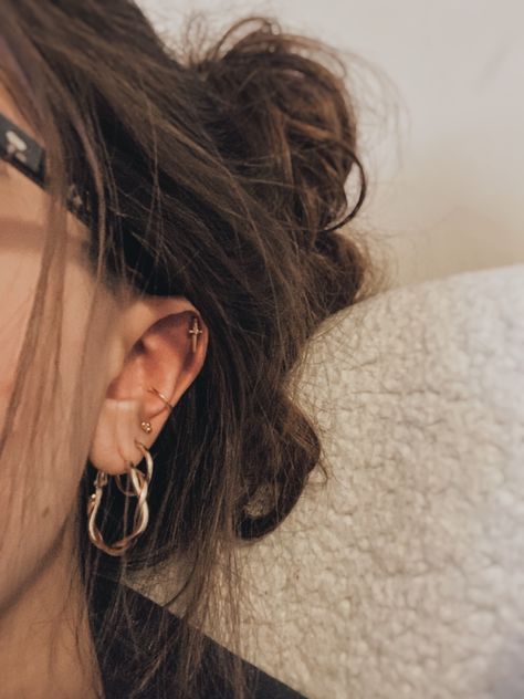 cartilage
 dagger earring with gold hoops and tri stud Masc Earring, Gold Earring Stack, Earring Stacks, Earring Inspo, Earring Stack, Ear Stack, Gold Earring, Tattoos And Piercings, Ear Piercings