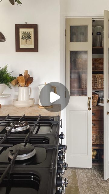 Anna King on Instagram: "I made these pantry doors a few years ago from some pine bi-fold doors I picked up in the sale! I wanted them to resemble bakery style doors so I stained & distressed them & added vintage rolling pins for handles! They have been much loved over the years & have been the most talked about feature in our home! It seems a lot of you love the rustic & unique look! But as time goes by my tastes have change & I wanted a cleaner & more modern look so I decided to give them a little makeover! I started by removing the top 2 panels to create windows, sanded & filled before painting with @farrowandball in the colour Dropcloth! For the frosted windows, I measured the open spaces & got some Perspex cut to size @cutmy.uk This was soooo much easier than cutting them myself! Pantry Accordian Door Ideas, Fold In Doors, Small Pantry French Doors, Pantry Door Inspiration, Small Double Door Pantry, Kitchen Pantry Bifold Doors, Pantry Door Remodel, Pantry Bifold Door Makeover, Stained Glass Pantry Door Ideas