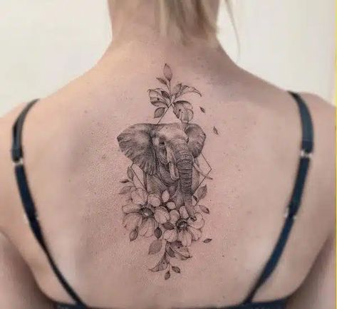 Creative Elephant Tattoos, Elephant Tattoos With Flowers Half Sleeves, Elephant Back Tattoo, Elephant Tattoos With Flowers, Back Tattoo Designs For Women, Elephant Art Tattoo, Dainty Tats, Back Tattoos For Women, Back Tattoo Designs