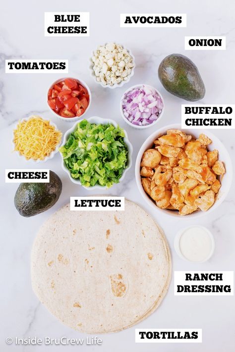 Buffalo chicken and all your favorite toppings make these healthy buffalo chicken wraps an easy choice for dinner. Great recipe to make for busy days! Healthy Buffalo Chicken Wraps, Buffalo Chicken Wraps Healthy, Easy Chicken Wrap, Buffalo Chicken Wrap Recipe, Buffalo Chicken Wrap, Chicken Wrap Recipe, Chicken Wraps Healthy, Bacon Wrapped Pork Chops, Buffalo Chicken Wraps