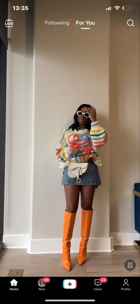 Orange Skirt Outfit Black Woman, Fall Color Blocking Outfits Black Women, Tall Girl Outfits Black Women, Brunch Outfit Black Woman Winter, Orange Fall Outfits Black Women, Orange Boots Outfit, Orange Fits Black Women, Birthday Brunch Outfit Black Woman, Fall Streetwear Color Block Sweater