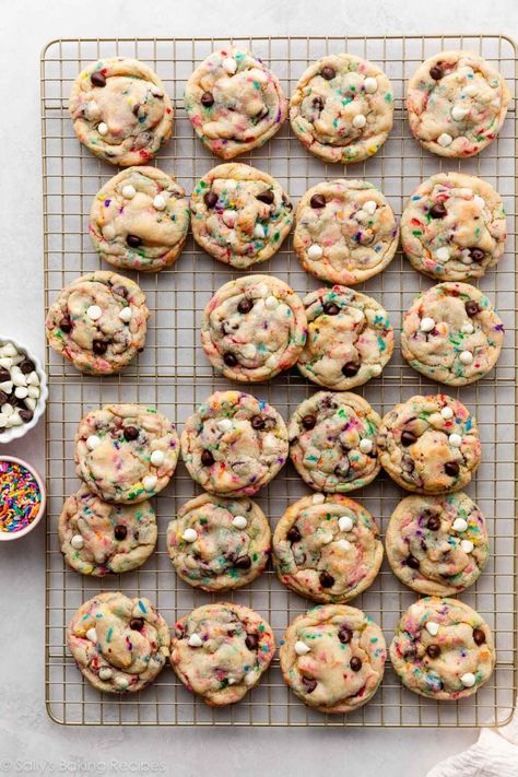 These cake batter chocolate chip cookies are a cross between soft-baked chocolate chip cookies and sprinkle-filled cake. For over a decade, this has remained one of the most popular cookie recipes on my site, and after baking a batch, you'll taste why. If you love chocolate chip cookies and sneaking a taste of cake batter, you will love these fun cookies! Recipe on sallysbakingaddiction.com Cookie Baking Tips, Christmas Chocolate Chip Cookies, Basic Chocolate Chip Cookies, Cake Batter Cookies, Popular Cookies, Chocolate Chip Cookie Cake, Sally's Baking, Vanilla Cake Mixes, Chicken Crockpot