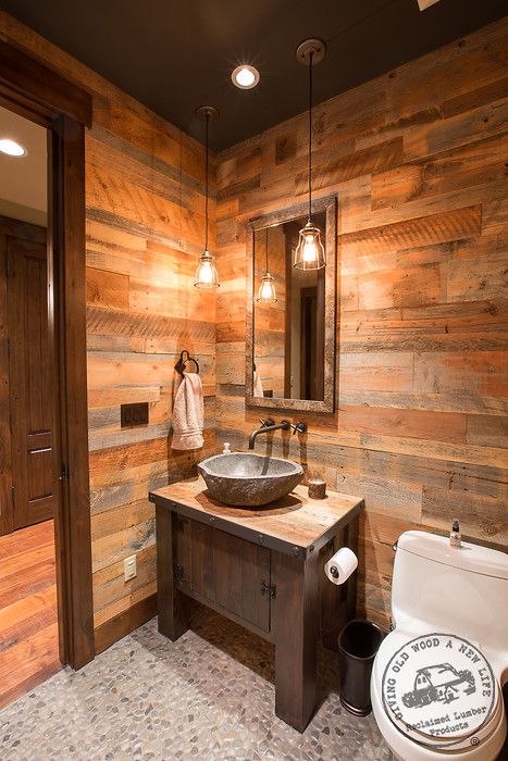 Reclaimed wood used in a bedroom as a featured wall  #reclaimed #reclaimedwood #homedecor #rustic #barnwood Wood Accent Wall In Bathroom, Cool Paneling Ideas, Barnwood Bathroom Ideas, Wooden Bathroom Interior, Bathroom Wall Wood Planks, Cedar Interior Walls, Cedar Walls Interior Bathroom, Cedar Bathroom Walls, Barn Wood Wall With Door