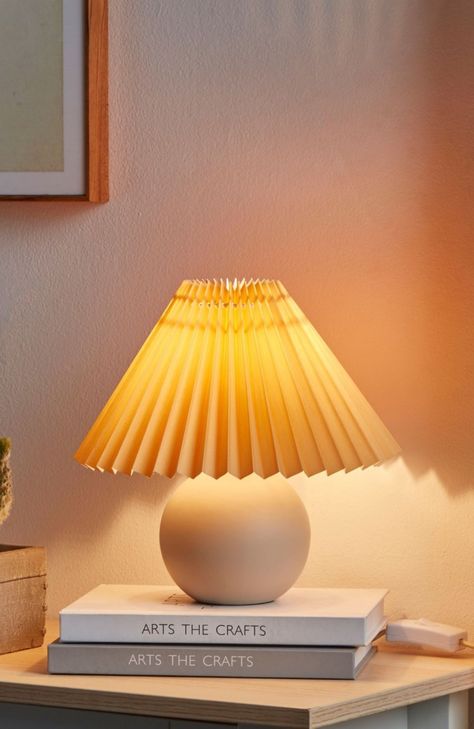 Enhance your space with the retro charm of the Brightech Serena Ceramic LED Table Lamp. This cute and elegant lamp, featuring a sophisticated orange-toned ceramic globe base, adds a touch of Asian-inspired design to any setting. Its retro flair is perfect for a variety of decor styles, including rustic, boho, contemporary, eclectic, and Asian-themed interiors. The cream-colored, pleated textile shade offers a romantic ambiance, diffusing warm white light that's inviting and soothing for the eyes Lamp Small Space, Asthetic Bedside Lamps, Bohemian Office Lamp, Tiny Bedside Table Lamps, Table Lamp Dorm, Boho Bedside Lamp Anthropologie, Orange Toned Lamp, Nursery Bedside Lamp, Night Stand Lamps Boho