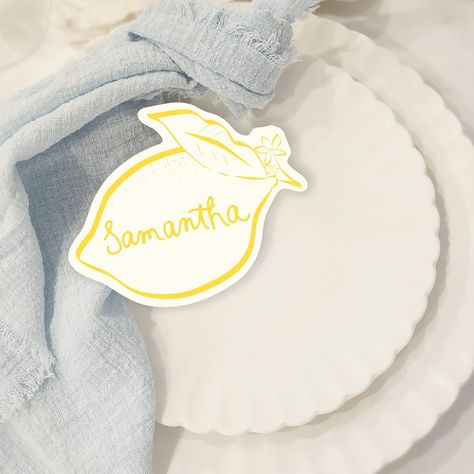 Add a touch of zest to your bridal shower with our lemon placecards! 🍋 Perfect for a lemon-themed celebration, these unique and fresh designs bring the charm of the Amalfi Coast to your special day. Let your "main squeeze" feel the love with every detail, making a vibrant statement that guests will remember! . . . . . #LemonPlacecards #BridalShowerDecor #MainSqueeze #AmalfiCoastVibes #MediterraneanStyle #LemonTheme #BridalShowerIdeas #FreshAndUnique #WeddingInspiration #BridalInspo #LemonLove... Amalfi Wedding Invitation, Lemon Wedding Decor, Creative Place Cards Wedding, Bridal Shower Place Cards, Mediterranean Table, Table Name Card, Place Cards Template, Place Card Table, Lemon Wedding