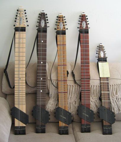 The "Chapman Stick"...Coolest instrument EVER!  No strumming or picking needed and you play all the melody with both hands.  Check out some of the videos of it in action on YouTube.  Way cool!!!  I'd love to have one of these!  :) Chapman Stick, Traveler Guitar, Custom Bass Guitar, Homemade Instruments, Custom Bass, Guitar Diy, Boutique Guitar, Diy Instruments, Bass Amps