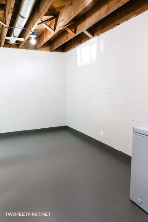 How-to-paint-a-concrete-floor Paint Laundry Room Floor Concrete, Redo Basement Floor, Painted Cement Walls Basements, Painted Floor Basement, Dark Basement Flooring, Basement With Painted Concrete Floors, Gray Painted Concrete Floors, Paint Basement Concrete Walls, Basement With Concrete Walls