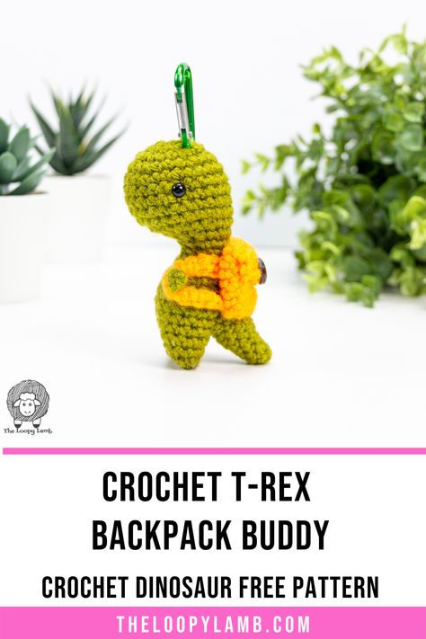 Learn how to crochet a T-Rex Backpack Buddy with this crochet dinosaur free pattion from Theloopylamb.com. This amigurumi dinosaur is perfectly sized to clip onto backpacks and has a functioning backpack! Makes a great gift or stocking stuffer. #HumansThatYarnWeC21 #freecrochet #dinosauramigurumi #crochetdinosaur #easycrochet Crochet Dinosaur Keychain, Dinosaur Free Pattern, Crochet T-rex, Crochet Dinosaurs, Amigurumi Dinosaur, Crochet Keychains, Dinosaur Backpack, Animal Amigurumi, Fall Crochet