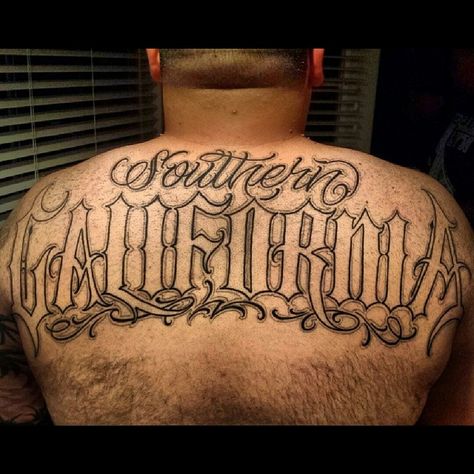 "SOUTHERN CALIFORNIA" Kicked It with my boi @ramon_antonio & saw that this was ready to go for another sesh but this big beast is scared to finish up... Let's give this foo some inspiration, 1000 likes & he'll come in to handle the scandal. Lol jk dawg I just wanted to share this tattoo again. #SouthBay #bSmashin #SanDiego #PalmAvenue #California #Custom #Script #Lettering #Tattoos #TattoosByEdmar @Nittis_Tattoo 1037 Broadway Chula Vista Ca, 91911 (619)427-6484 California Old English Tattoo, California Script Tattoo, Southern California Tattoo, Ca Tattoo California, Chula Tattoo, California Tattoos, Lowrider Tattoo, Old English Tattoo, Lettering Tattoos