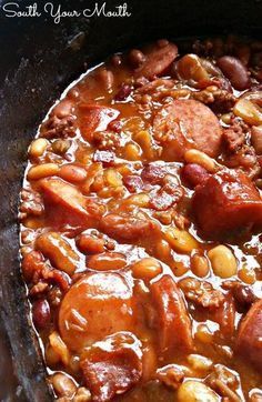 Three Meat Crock Pot Cowboy Beans | BBQ beans with smoked sausage, bacon and ground beef! Slow Cooker Chicken Mushroom, Sausage Crockpot Recipes, South Your Mouth, Bean And Bacon Soup, Beans In Crockpot, Bbq Baked Beans, Sausage Crockpot, Bbq Beans, Cowboy Beans