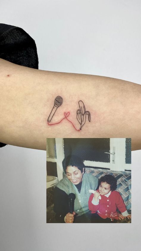 mother, daughter, mic, banana, tattoo, meaningful tattoo simple modern minimalist Mic Tattoo, Banana Tattoo, Mother Daughter Tattoo, Tattoo Meaningful, Daughter Tattoo, Meaningful Tattoo, Tattoo Simple, Mother Daughter Tattoos, Tattoos For Daughters