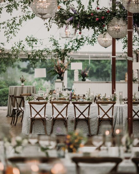 In a large tent, our goal is to create an intimate atmosphere. For J+K, we achieved this by using ambient lighting and suspended greenery (courtesy of @griffingriffinlighting). Additionally, we added an experiential touch for guests with live portrait painting by @quinnevansart. Venue // @fpmaine Planner // @pinchmeplanning Photography // @chrisbennettweddings Videography // @rebeccadrouin_ Caterer // @bigtreecatering Entertainment // @gye.band Florals // @yellowtwistdesign Lighting + Green... Large Tent, Experiential, Ambient Lighting, Portrait Painting, Tent, Green, Floral, Photography