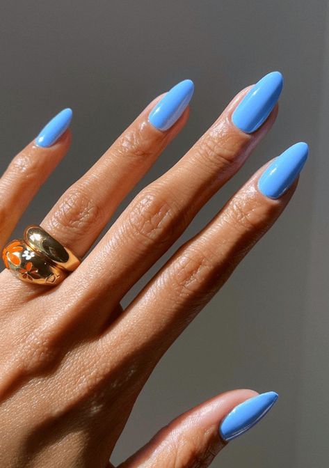 Blue nails are the biggest trend of 2024, and that's why we've created a list of blue nail designs that are super cute all year round! From light blue nails and blue French tips to marble blue nails - you'll find something you like. #bluenails #pinteresttrends #ombreblue #lightblue #darkblue Trendy Blue Nails, Blue Wedding Nails, Light Blue Nail Designs, Blue Chrome Nails, Blue And Silver Nails, Sky Blue Nails, Blue Nail Art Designs, Blue And White Nails, Royal Blue Nails