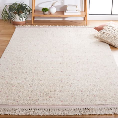 This hand-woven rug from SAFAVIEH's Easy Care Collection brings casual boho style to everyday living. Its soft cotton fibers provide a comfortable feeling underfoot, while trendy tassels add whimsical flair. Nursery Rugs Neutral, Polka Dot Rug, Rug Colors, Pink Ivory, Classic Rugs, Nursery Rugs, Transitional Rugs, Ivory Rug, Neutral Rugs