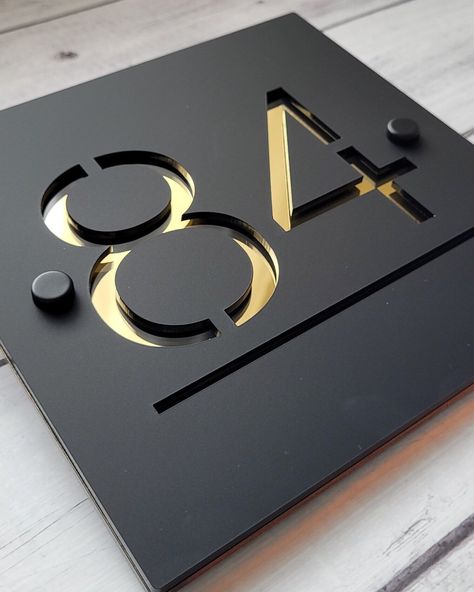 A contemporary house sign that will put the finishing touch to the front of your home. This door number sign is made from a 3mm white or black acrylic with an contrasting 3mm coloured acrylic backing. There are several choices of backing colours which are mirrored silver, gold, rose gold, mirrored red, mirrored blue or orange. All materials are UV stable and weather resistant making this modern house sign one of the toughest on the market. The photos don't do them justice - they are stunning! Ho House Number On Garage, External Front Doors, Glass Signage, Address Marker, Door Number Sign, Hallway Door, Name Plate Design, House Address Sign, Address Signs