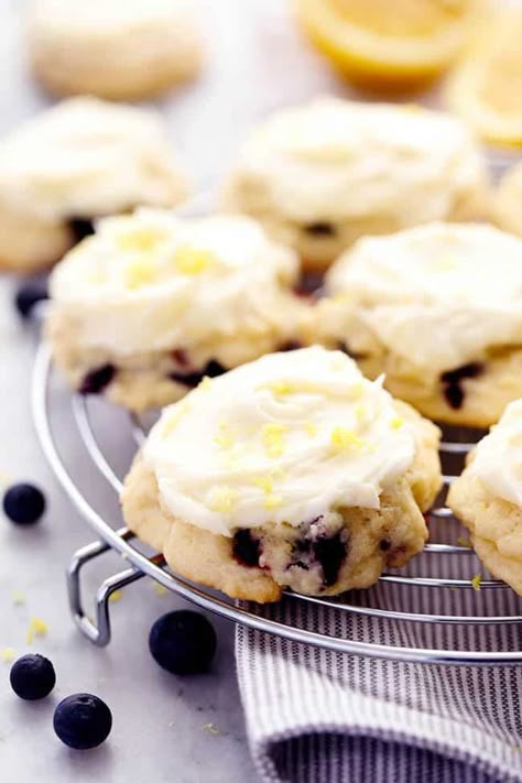 Blueberry Lemon cookies are soft, cake like cookies that are bursting with fresh blueberries and have a hint of lemon. These cookies melt in your mouth and are topped with the most amazing lemon cream cheese frosting! Blueberry Lemon Cookies, Blueberry Cream Cheese Frosting, Lemon Blueberry Cookies, Cookies With Lemon, Cookies Lemon, Super Cookies, Lemon Layer Cakes, Lemon Cream Cheese Frosting, Lemon Cream Cheese