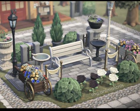 Animal Crossing Sitting Area Ideas, Acnh Telephone Booth, Sitting Area Acnh, Acnh Seating Area, Acnh Player House Exterior Ideas, Acnh Plaza Idea, Acnh Town Plaza Ideas, Cottagecore Animal Crossing, Garden Sitting Areas