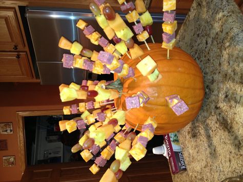 Cheese and sausage and Fruit Skewers into a pumpkin, poke holes in pumpkin first before attempting to put skewers in Fruit And Cheese Skewers, Turkey Fruit, Cheese Skewers, Halloween Appetizer, Pumpkin Turkey, Fruit Skewers, Halloween Appetizers, Cheese Appetizers, Fun Foods