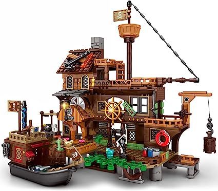 Amazon.com: Mesiondy Pirate Ship Set Pirate's Wharf Supply Center Building Brick Toy, for Boys and Girl Ages 8 Years and up, 573 Pcs : Toys & Games Pirate Toys, Big Lego, Pirate Island, Baby Activities, Model Boats, Pirate Ship, Toy Craft, Lego Sets, Toy Sets