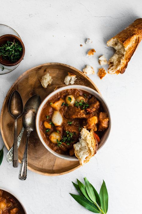 Nothing quite beats a warming bowl of stew on cold winter nights. You want something hot, nourishing, deeply savory with pops of bright herbs. And this Beef and Bacon Stew recipe hits all the right marks. In the end you have an easy recipe with tons of flavor. Bacon Stew, Seasonal Cooking, Chili Soup, Filling Dinner, Poached Chicken, Slow Cooked Beef, Soup Kitchen, Savory Soups, Stew Recipe