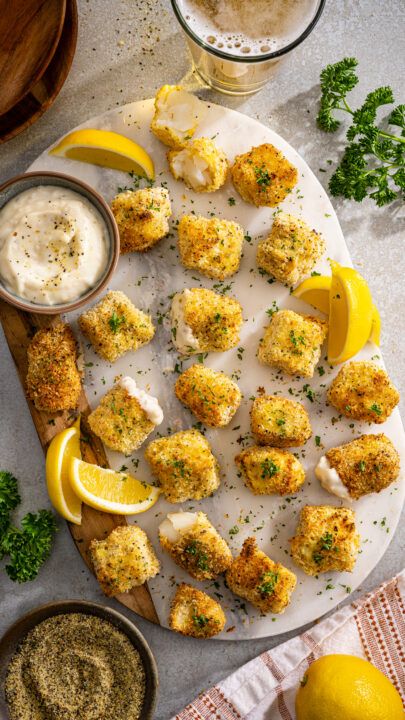 Air Fryer Fish Nuggets - Our Family Dinner Ideas Fish, Fish Nuggets, Fried Cod, Air Fryer Fish, Friends Time, Lemon Pepper Seasoning, Tartar Sauce, Panko Bread Crumbs, Lemon Wedge