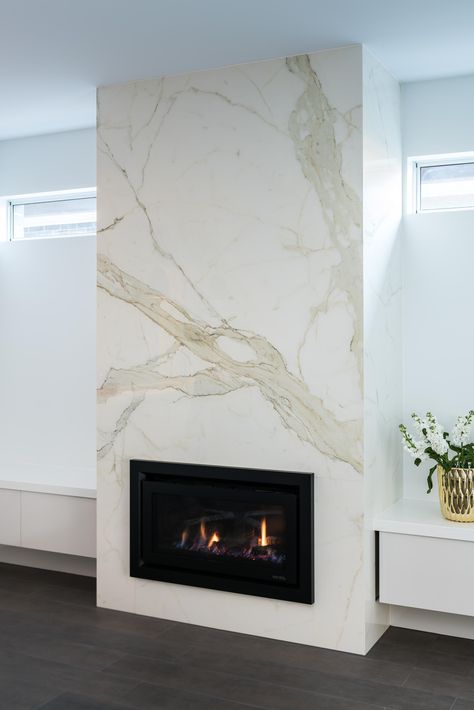 Staturio Porcelain sheet Tile Fireplace Ideas, Tiled Fireplace Wall, Black Tile Fireplace, Caesar Stone, Contemporary Fireplace Designs, Fireplace Feature Wall, Marble Products, Fireplace Tv Wall, Living Room Decor Fireplace