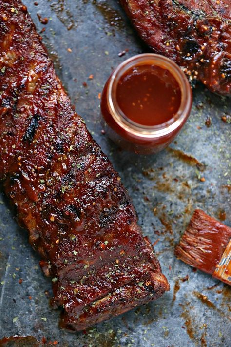 Grilled Ribs with Watermelon BBQ Sauce are super easy to make and pack a serious flavour punch. Your family and friends will be begging for second helpings of this one. Be sure to have extra napkins on hand! #grill #watermelon #ribs #dinner  via @CravingsLunatic Watermelon Bbq, Outdoor Grilling Recipes, Grill Ribs, Grilled Ribs, Grilled Watermelon, Outdoor Cooking Recipes, Easy Main Dishes, Side Dishes For Bbq, Ribs On Grill