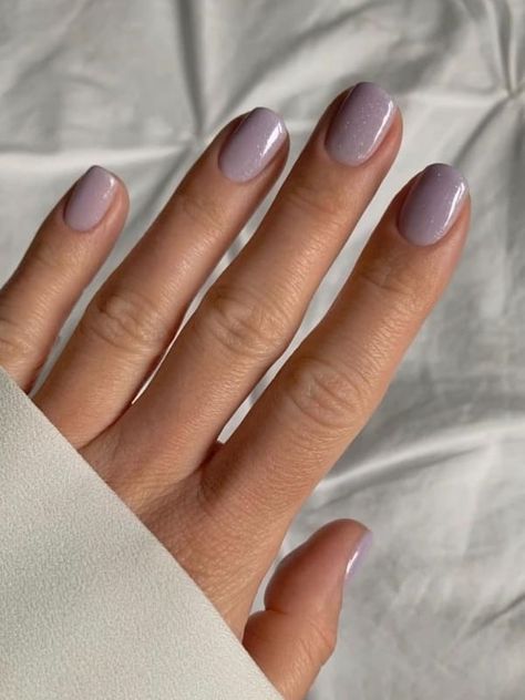 23 Cute Winter Nail Colors You'll Be Obsessed With This Season | Everygirl Edit Nails In January Colour, Winter Nails For Fair Skin, Modern French Mani, Winter Solid Color Nails, Winter Almond Nails Short, Dip Powder Nails Winter 2024, Cool Winter Nail Colors, Winter Dipped Nails Ideas, Pastel Winter Nails