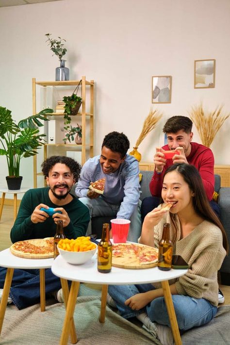 Group of multiethnic friends eating pizza and playing video games at home. royalty free stock photo Friends Eating Pizza, Games At Home, Friends Eating, Pizza Photo, Shared Apartment, Eating Pizza, Playing Video Games, Video Games, Royalty Free Stock Photos