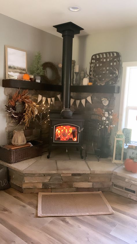 #cornermantle #fall #woodstove #falldecor #mountianlife #fallvibes #mountianhouse #homedecorideas Corner Wood Burning Stove, Root Seller, Corner Mantle, Wood Burning Stove Corner, Stove Surround, Corner Wood Stove, Wood Stove Surround, Stove Hearth, Corner Fireplace Living Room