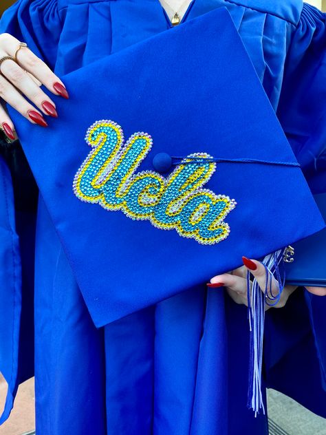 #uclagradcap #graduationcapdesigns #gradcap #gradcapinspo #gradcapideas #graduationcap #graduationcapdesigns #uclacap #motorboarddesigns #graduation #highschoolgraduation #stonedgradcap #stones #crystals #ucla Ucla Grad Cap, Grad Cap Designs, Graduation Cap Designs, Cap Designs, Grad Cap, High School Graduation, Graduation Cap, Crystals