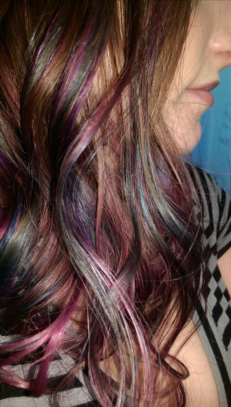 "Oil Slick" multi-colored hair dyed and cut A-line styled. Coloured Streaks In Hair Brown, Colorful Streaks In Brown Hair, Brunette Hair With Colored Highlights, Colorful Lowlights, Brown Hair With Rainbow Highlights, Siren Hair Color, Oil Spill Hair Color, Oil Spill Hair, Streak Hair