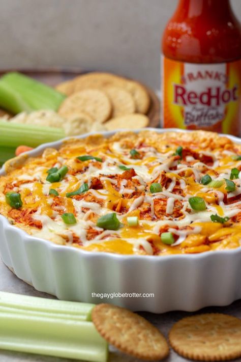 This easy homemade buffalo chicken dip recipe is one of our favorite party appetizer dips. It’s an easy buffalo chicken dip recipe using leftover chicken pieces, Franks buffalo sauce, and cream cheese! #gayglobetrotter #buffalochickendip #buffalodip #chicken #buffalochicken #dip #appetizer #franks Franks Buffalo Chicken, Franks Buffalo Chicken Dip, Recipe Using Leftover Chicken, Buffalo Chicken Nachos Recipe, Buffalo Chicken Dip Oven, Healthy Buffalo Chicken Dip, Buffalo Chicken Pasta Salad, Buffalo Chicken Dip Crock Pot, Buffalo Chicken Dip Easy