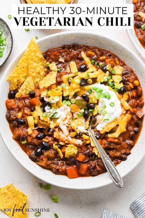 This vegetarian chili recipe is easy to make in 30 minutes on the stovetop. It’s loaded with veggies and perfectly seasoned with a homemade spice mixture. It's a healthy, hearty and cozy meal.