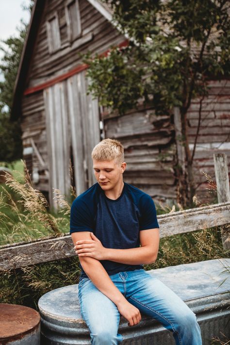 jeans Western Midwestern highschool senior senior boy senior poses senior pictures outdoor senior pictures old buildings abandoned pasture field downtown home town Clark South Dakota t-shirt  football field Guy Senior Poses, Downtown Home, Highschool Senior, Outdoor Senior Pictures, Trap Shooting, Jeans Western, Blonde Hair Boy, Senior Boy Poses, Hair Boy