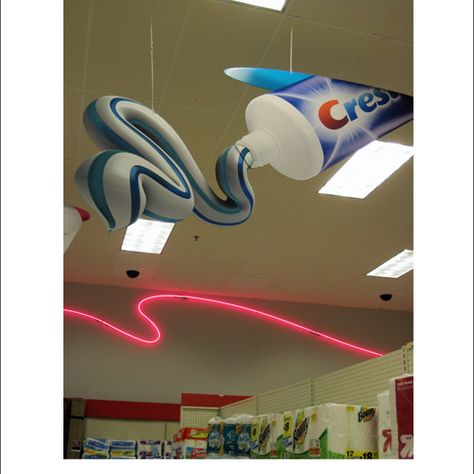 Crest Squirting Tube Ceiling Sign Point Of Sale Design, Dangler Design, Grey Floral Wallpaper, Pos Design, Shopper Marketing, Retail Design Display, Point Of Sale Display, Pos Display, Market Displays