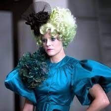 effie trinket from the hunger games. can be used for icons and designs. Hunger Games Hair, Hunger Games Makeup, Hunger Games Effie, Hunger Games Outfits, Capitol Couture, Hunger Games Fashion, Effie Trinket, Light Movie, Hunger Games 3