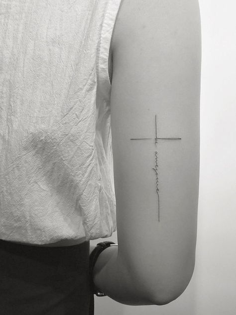 Crossword Tattoo Ideas, Felicita Tattoo, Cross Fine Line Tattoo, Tatouage Resilience, Cross Spine Tattoos For Women, Back Elbow Tattoo, It Is Finished Tattoo, All In Tattoo, Above Elbow Tattoos For Women