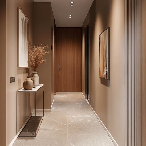 This Scandinavian hallway's color palette is a masterful blend of simplicity and sophistication, with a harmonious mix of cool and warm neutral tones punctuated Entrance Hall Narrow, Scandinavian Corridor, House Corridor Design, Entrance Hallway Decor, Small Hallway Design, Corridors Design, Corridors Design Home, Cream Hallway, Hallway Aesthetic