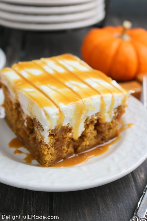 The ultimate fall dessert! A pumpkin spice cake is drizzled with caramel sauce, frosted with a decadent cream cheese frosting and topped with even more caramel sauce! You'll love every single morsel of this uber moist, delicious cake! Pumpkin Caramel Poke Cake Recipe, Cream Cheese Poke Cake, Layered Pumpkin Dessert, Pumpkin Poke Cake, Poke Cake Recipe, Caramel Cream, Torte Cupcake, Poke Cake Recipes, Pumpkin Spice Cake