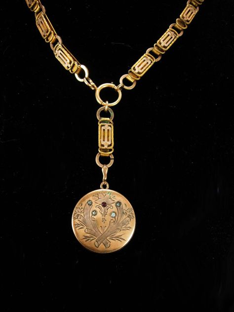 This beautiful victorian paste clear and garnet rhinestone locket opens up to reveal the original date of 1874 on the inside. It is signed RBM Vintage Necklace Antiques, Victorian Gold Brass Necklace, Victorian Gold Metal Locket Necklace, 1800s Jewelry, Moon Locket, Victorian Gold Brass Locket Necklace, Ornate Antique Gold Brass Locket Necklace, Ornate Bronze Brass Locket Necklace, Gold Coin Jewelry