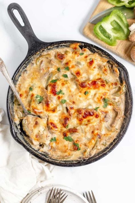 Philly Cheesesteak Casserole | Little House Big Alaska Philly Cheese Steak Casserole Recipe, Philly Cheesesteak Casserole, Cheesesteak Casserole, Philly Cheese Steak Casserole, Sweet Bell Peppers, House Big, Philly Cheesesteak, Gooey Cheese, Tender Beef