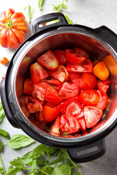 This Instant Pot Tomato Soup is super flavorful and made with fresh garden tomatoes! Besides the fresh tomatoes and lots of basil, the flavors come from a base of sautéed onions, garlic, spices and vegetable broth. #instantpottomatosoup #tomatosoup Garden Tomato Soup Instant Pot, Tomato Soup Pressure Cooker, Insta Pot Tomato Soup Recipes, Roma Tomato Soup Recipe, Roma Tomatoes Soup, Fresh Tomato Soup Instant Pot, Tomato Soup Recipe Instant Pot, Instapot Tomato Soup Recipes, Instant Pot Tomato Recipes