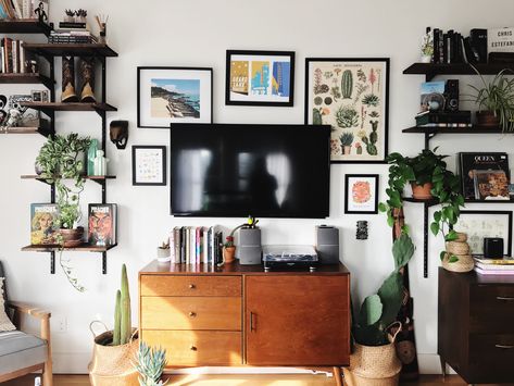 Small living decor #apartmenttheraphy #smallspaces #apartmentdecor #gallerywall Decorate Media Console, Small Tv Console Ideas, Tv Console Decorating Ideas, Media Console Styling, Small Media Console, Small Tv Console, Tv Console Decorating, Tv Console Decor, Tv Media Console