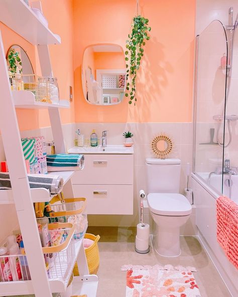 Rosie Dickens | 🐠 my skincare sanctuary, peachy paradise and toiletries utopia 🧴 my bathroom is all about fun patterns and colourful storage, who wants to… | Instagram Preppy Small Bathroom, Tiny Colorful Bathroom, Orange And Pink Bathroom Ideas, Orange Pink Bathroom, Colourful Small Bathroom, Pink Orange Bathroom, Pink And Orange Bathroom, Pastel Bathroom Ideas, Bathroom Colourful