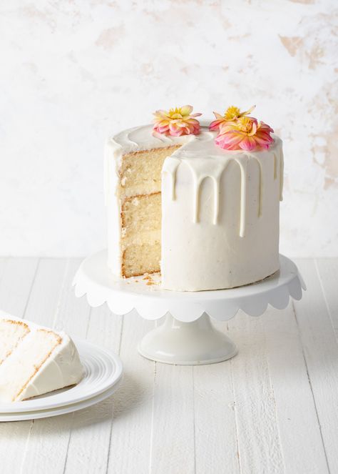 White Velvet Cake - Style Sweet White Chocolate Drip Cake, Moist Lemon Pound Cake, Whipped Buttercream Frosting, White Chocolate Drip, White Velvet Cake, Easy Chocolate Ganache, White Velvet Cakes, Strawberry Cake Filling, Buttercream Cake Designs