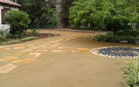 This California Zen landscape was done for a Buddhist retreat in the LA area.  Its refined simplicity adds to the serenity of the natural setting.  Besides the flagstone walkways on top of DG--decomposed granite there is the unique emblem construction.  The center symbol was made of small gravel, while outside of it are different colors of river rocks. In addition to the restful aesthetics of this landscape, the practical benefits are the water savings & low-maintenance needed. Composite Granite Landscape, Backyard Mulch Landscaping, Backyard Reading, Buddhist Retreat, California Landscaping, Decomposed Granite Patio, Zen Landscape, Desert Backyard, Zoysia Grass