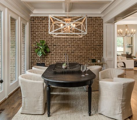 Adorable dining space with a brick accent wall. Farmhouse Dining Room Accent Wall, Exposed Brick Dining Room, Accent Wall Neutral, Brick Wall Dining Room, Brick Dining Room, Exposed Brick Accent Wall, Accent Wall Dining, Accent Wall Dining Room, Wall Dining Room